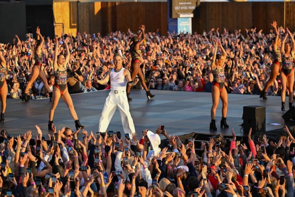 Robbie Williams performs on stage at BST Hyde Park (Photo by Dave Hogan/Hogan Media Shutterstock)